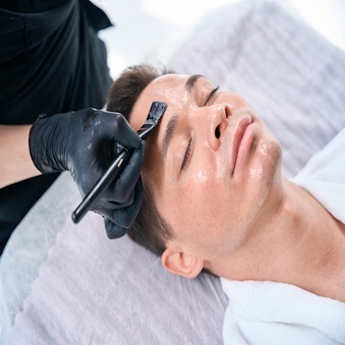 Young Caucasian man lying in the cosmetologist office having facial peeling procedure SSUCv3H4sIAAAAAAAACoxSy27cMAy8F+g/GDrXqLzyM1+QS4Degx4oibsWorUMSU4RLPbfS/mxVVAU6E0cipzhkLevX4qCSQhGsafiliKKjbVLiB6icRPB/NuOe5w0+hx596LlOQAmj1Cb6LwBm4MSohonuCKB02Jtgu9rkoUIcQkYMi1g4fpBcXWUh3GJEX2ITr0lPCtXEPFCfJ8aHMO9bnFxJNYkVVCK/UA3W2Q7xUazyJR5MUGhtTChWwI78hvfP5o9I9g4KvD4/YUMUDT9/zfeHj8fdl5wUmn82z2b06NF2Gzap2IddKKpsS+xr1RZK1mXA1SyHLTmvG2kBMkPGUycsdG8a8q+anlZD+JcStFi2fAemkb0mmtYJW062NsvMvy6mrorgEUbl5n87mjM9EFkMsHM4OFT3eyNMtMlQ1wc15M6Oim3TNGnkdmpGh6SrXMzSNrRU3EmJjzwEUKgCn3g+TXQDbtrRjW5uHrGtq5M07mksBJiOAneNH1NL1F1u1P7OY6G+qyKDo3LbB1oTKSP/f851K7uekHGnh5b/+tmty8DP20/8t2uf4zOTTOJiCldKcU7WQLotOGqKwdFr7ZqOjlAR8m0tPtvAAAA//8DAFY7eZ7TAwAA